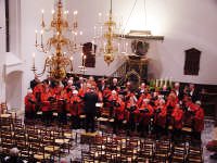 Het Heijse kerkkoor zingt in Loosduinen op 9 december 2001, met dank aan de Fam. Tas-Storm voor de foto.